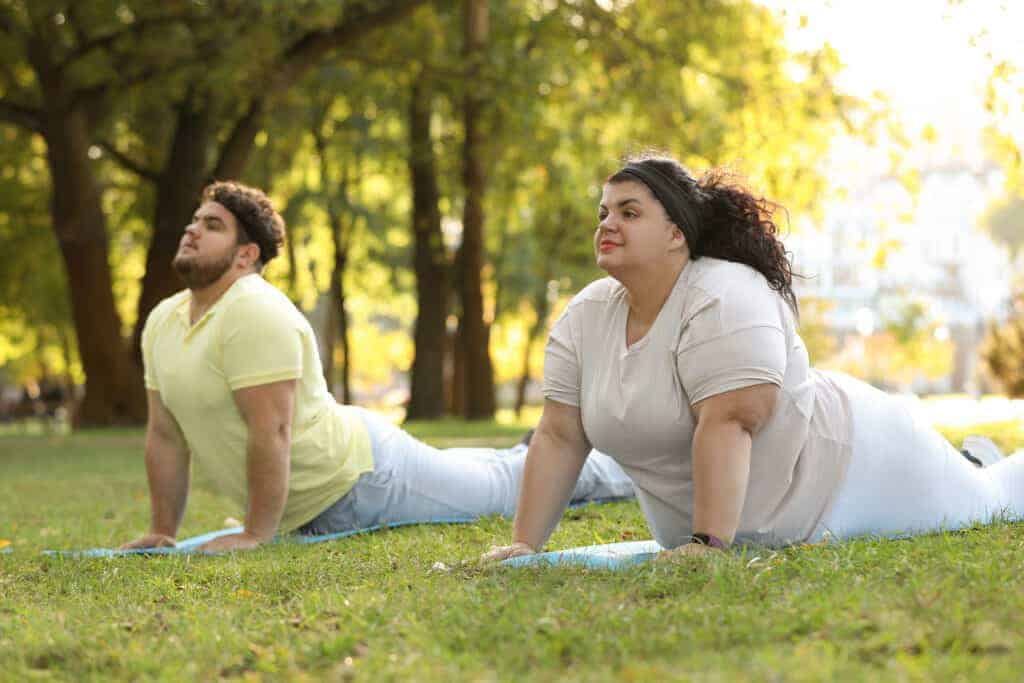 couple working out in a plus size relationship